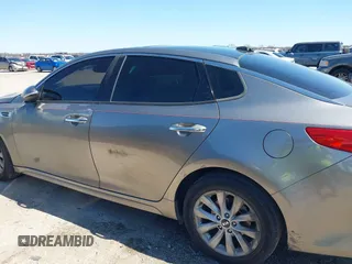 2016 Kia Optima EX with VIN 5XXGU4L31GG106854, listed as a IAAI auction lot 41762052 with 122,121 mi miles. Bid and sale history available at carsss.com. Image 14.