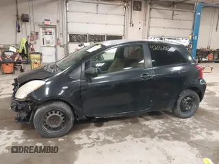 2008 Toyota Yaris with VIN JTDJT923285196299, listed as a IAAI auction lot 42152850 with 214,238 mi miles. Bid and sale history available at carsss.com. Image 13.