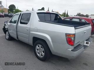 2006 Honda Ridgeline RTL with VIN 2HJYK16566H532598, listed as a IAAI auction lot 42184828 with 91,817 mi miles and . Bid and sale history available at DreamBid. Image 3.
