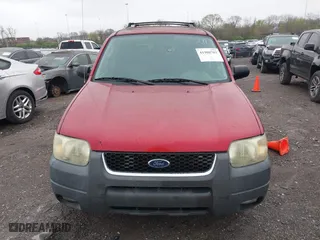 2004 Ford Escape XLT with VIN 1FMCU03114KA54144, listed as a IAAI auction lot 41908703 with 238,791 mi miles. Bid and sale history available at carsss.com. Image 6.