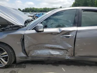 2019 Infiniti Q50 Luxe with VIN JN1EV7AR7KM591889, listed as a Copart auction lot 61304425 with 73,712 mi miles and Salvage title. Bid and sale history available at DreamBid. Image 7.