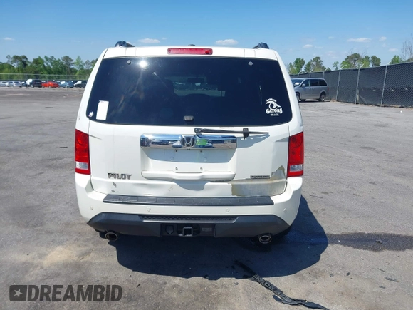 2015 Honda Pilot Touring with VIN 5FNYF3H92FB020766, listed as a IAAI auction lot 41983315 with 201,086 mi miles. Bid and sale history available at carsss.com. Image 16.