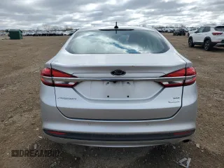 2018 Ford Fusion SE с VIN 3FA6P0HDXJR130582, выставлен на аукционе Copart как лот 53169815 с пробегом 137 512 миль миль и Списание • Salvage title. История ставок и продаж доступна на DreamBid. Изображение 6.