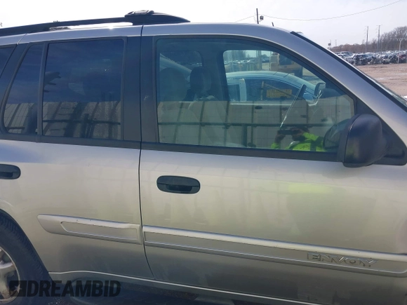 2005 GMC Envoy SLE with VIN 1GKDS13S252284455, listed as a IAAI auction lot 41455172 with 171,559 mi miles and . Bid and sale history available at DreamBid. Image 13.