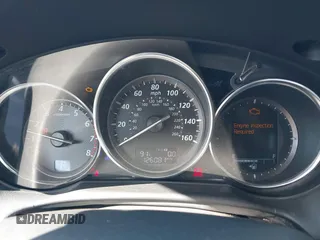 2014 Mazda CX-5 Grand Touring with VIN JM3KE2DY7E0376389, listed as a IAAI auction lot 42014946 with 126,081 mi miles. Bid and sale history available at carsss.com. Image 7.