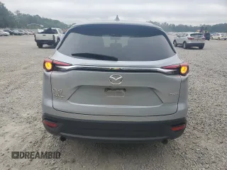 2022 Mazda CX-9 Touring with VIN JM3TCBCY6N0607357, listed as a Copart auction lot 54316745 with 66,888 mi miles and Salvage title. Bid and sale history available at DreamBid. Image 6.