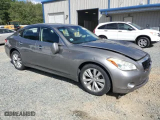 2011 Infiniti M37 with VIN JN1BY1APXBM325191, listed as a Copart auction lot 74209614 with 136,662 mi miles and Salvage Title. Bid and sale history available at carsss.com. Image 4.