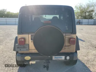 1999 Jeep Wrangler Sport with VIN 1J4FY19S7XP464377, listed as a Copart auction lot 73062074 with 89,915 mi miles and Salvage Title. Bid and sale history available at carsss.com. Image 6.