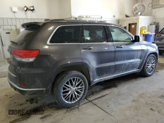 2017 Jeep Grand Cherokee Summit with VIN 1C4RJFJT4HC723876, listed as a Copart auction lot 52647205 with 97,412 mi miles and Salvage title. Bid and sale history available at DreamBid. Image 3.