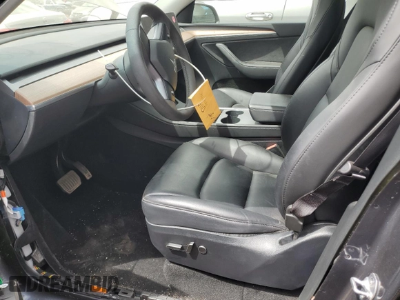 2023 Tesla Model Y Long Range z VIN 7SAYGDEE7PF965446, wystawiony jako Copart lot #54710375 z przebiegiem 23 807 mil mil oraz Szkoda całkowita • Salvage title. Historia ofert i sprzedaży dostępna na DreamBid. Obrazek 7.