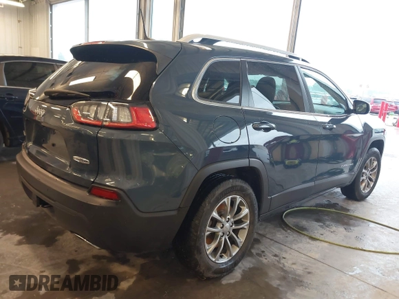 2019 Jeep Cherokee Latitude Plus with VIN 1C4PJMLX0KD361879, listed as a IAAI auction lot 40435950 with 148,830 mi miles. Bid and sale history available at carsss.com. Image 4.