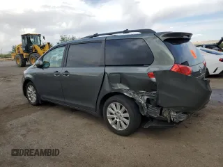 2014 Toyota Sienna LE with VIN 5TDJK3DC4ES085384, listed as a Copart auction lot 60375125 with 81,696 mi miles and Salvage title. Bid and sale history available at DreamBid. Image 2.