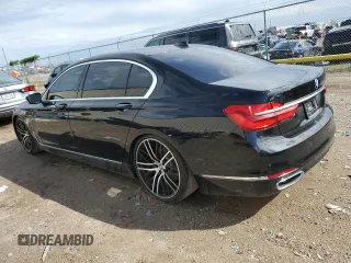 2018 BMW 7 Series 740i with VIN WBA7E2C57JG742193, listed as a Copart auction lot 79301864 with 87,706 mi miles and Salvage Title. Bid and sale history available at carsss.com. Image 2.