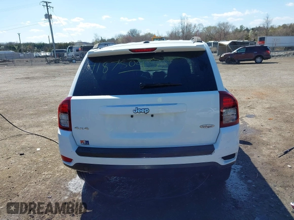 2015 Jeep Compass Latitude with VIN 1C4NJDEB7FD120738, listed as a IAAI auction lot 41878045 with 128,393 mi miles. Bid and sale history available at carsss.com. Image 16.