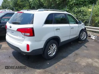 2015 Kia Sorento LX with VIN 5XYKTDA74FG632845, listed as a IAAI auction lot 42660399 with 93,386 mi miles and . Bid and sale history available at DreamBid. Image 4.