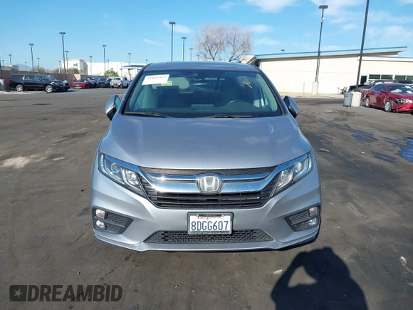 2018 Honda Odyssey EX-L with VIN 5FNRL6H71JB089289, listed as a IAAI auction lot 41813322 with 94,933 mi miles and . Bid and sale history available at DreamBid. Image 13.