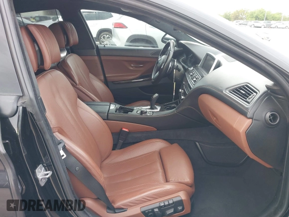 2014 BMW 6 Series 650i z VIN WBA6B2C55ED129419, wystawiony jako IAAI lot #39061341 z przebiegiem 68 790 mil mil oraz . Historia ofert i sprzedaży dostępna na DreamBid. Obrazek 5.