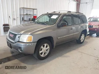 2005 GMC Envoy SLE z VIN 1GKDT13S252285747, wystawiony jako IAAI lot #42340642 z przebiegiem Nie podano mil oraz . Historia ofert i sprzedaży dostępna na DreamBid. Obrazek 2.