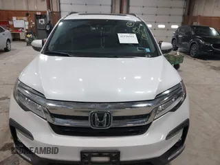2022 Honda Pilot Touring 7-Passenger with VIN 5FNYF6H63NB063857, listed as a IAAI auction lot 41936941 with 54,424 mi miles. Bid and sale history available at carsss.com. Image 11.