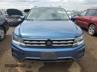 2018 Volkswagen Tiguan SEL z VIN 3VV2B7AX4JM076635, wystawiony jako Copart lot #54713815 z przebiegiem 162 692 mil mil oraz Szkoda całkowita • Salvage title. Historia ofert i sprzedaży dostępna na DreamBid. Obrazek 5.