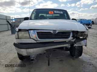 2000 Mazda B-Series 2WD Truck DS with VIN 4F4YR16VXYTM31299, listed as a Copart auction lot 44144695 with 123,283 mi miles and Salvage Title. Bid and sale history available at carsss.com. Image 5.
