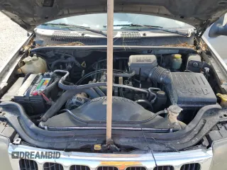 2000 Jeep Grand Cherokee Laredo with VIN 1J4G248S7YC321298, listed as a Copart auction lot 58036255 with 292,779 mi miles and Salvage title. Bid and sale history available at DreamBid. Image 12.