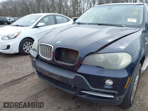 2007 BMW X5 4.8i z VIN 4USFE83547LY64828, wystawiony jako IAAI lot #41896182 z przebiegiem Nie podano mil oraz . Historia ofert i sprzedaży dostępna na DreamBid. Obrazek 6.