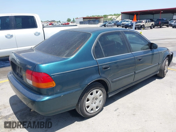 1998 Honda Civic LX z VIN 1HGEJ6671WL011642, wystawiony jako IAAI lot #42308904 z przebiegiem 77 380 mil mil oraz . Historia ofert i sprzedaży dostępna na DreamBid. Obrazek 4.
