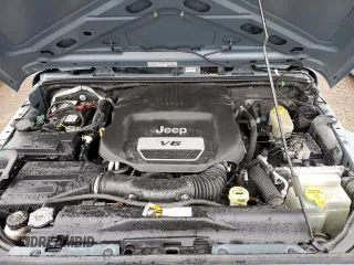 2014 Jeep Wrangler Sport с VIN 1C4AJWAG1EL117219, выставлен на аукционе Copart как лот 59696355 с пробегом 105 865 миль миль и Списание • Salvage title. История ставок и продаж доступна на DreamBid. Изображение 11.