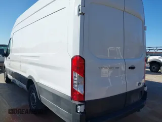 2023 Ford Transit Cargo z VIN 1FTBR3X8XPKA69739, wystawiony jako IAAI lot #41824302 z przebiegiem 67 703 mil mil oraz . Historia ofert i sprzedaży dostępna na DreamBid. Obrazek 3.