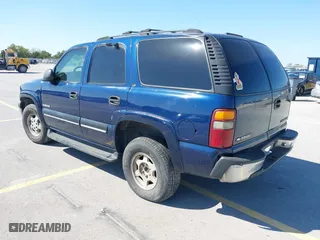2001 Chevrolet Tahoe LT with VIN 1GNEC13T71J184865, listed as a IAAI auction lot 41799799 with 290,196 mi miles. Bid and sale history available at carsss.com. Image 3.