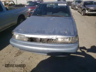 1991 Toyota Camry DLX z VIN 4T1SV21E2MU451022, wystawiony jako Copart lot #45333385 z przebiegiem 229 058 mil mil oraz Szkoda całkowita • Salvage title. Historia ofert i sprzedaży dostępna na DreamBid. Obrazek 5.
