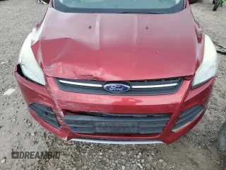 2013 Ford Escape SE with VIN 1FMCU0GX4DUC78270, listed as a Copart auction lot 58935755 with 163,837 mi miles and Salvage title. Bid and sale history available at DreamBid. Image 12.
