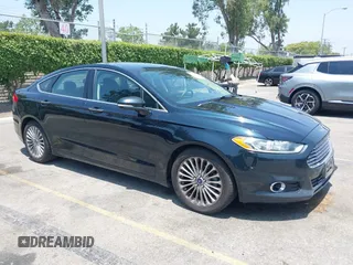 2014 Ford Fusion Titanium с VIN 3FA6P0K93ER177463, выставлен на аукционе IAAI как лот 42450617 с пробегом 173 064 миль миль и . История ставок и продаж доступна на DreamBid. Изображение 1.