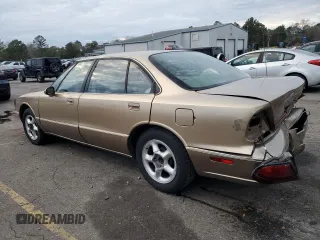 1998 Oldsmobile LSS z VIN 1G3HY52K2W4807516, wystawiony jako Copart lot #87669545 z przebiegiem Nie podano mil oraz Szkody całkowita. Historia ofert i sprzedaży dostępna na DreamBid. Obrazek 2.