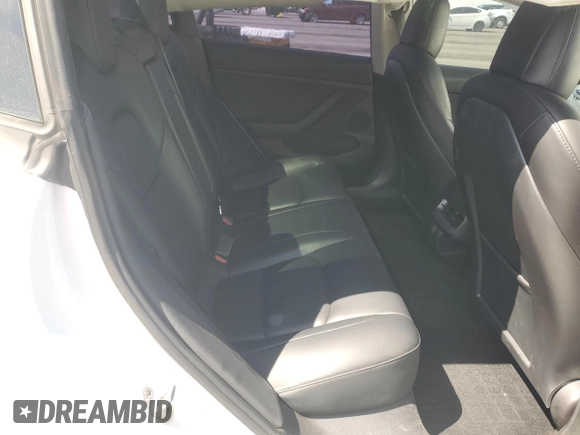2023 Tesla Model 3 with VIN 5YJ3E1EA8PF394705, listed as a Copart auction lot 52319945 with 58,193 mi miles and Salvage title. Bid and sale history available at DreamBid. Image 10.