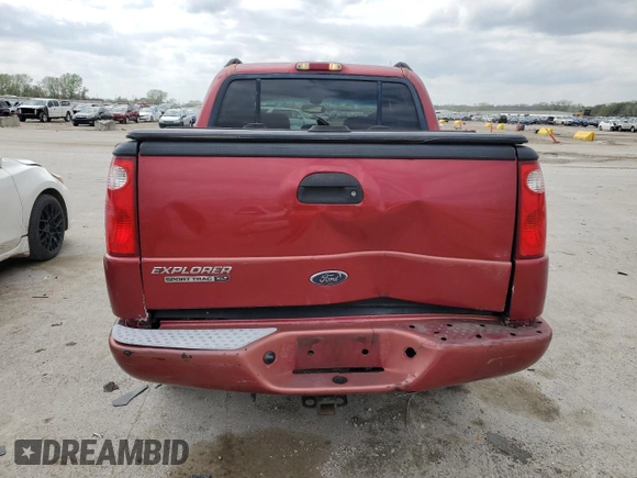 2004 Ford Explorer Sport Trac XLS z VIN 1FMZU67K94UA96937, wystawiony jako Copart lot #53692245 z przebiegiem 147 296 mil mil oraz Szkoda całkowita • Salvage title. Historia ofert i sprzedaży dostępna na DreamBid. Obrazek 6.