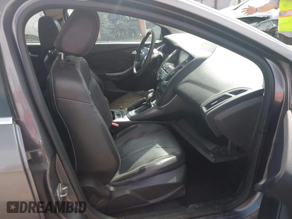 2014 Ford Focus Titanium with VIN 1FADP3J21EL299718, listed as a IAAI auction lot 41788080 with 91,748 mi miles. Bid and sale history available at carsss.com. Image 5.