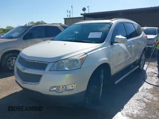 2011 Chevrolet Traverse LTZ with VIN 1GNKVLED9BJ158896, listed as a IAAI auction lot 42023356 with 203,809 mi miles and . Bid and sale history available at DreamBid. Image 2.