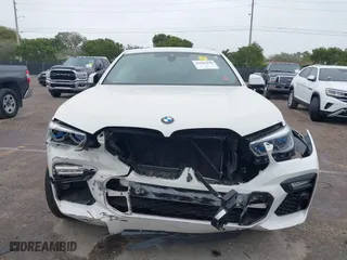 2021 BMW X6 xDrive40i with VIN 5UXCY6C00M9F88215, listed as a IAAI auction lot 41646498 with 43,587 mi miles. Bid and sale history available at carsss.com. Image 12.