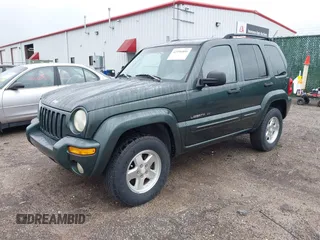 2002 Jeep Liberty Limited z VIN 1J4GL58K12W213087, wystawiony jako IAAI lot #42196895 z przebiegiem 85 110 mil mil oraz . Historia ofert i sprzedaży dostępna na DreamBid. Obrazek 2.