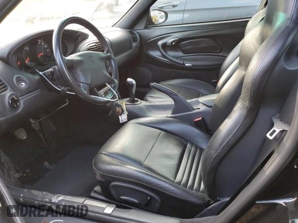 1999 Porsche 911 with VIN WP0AA2990XS626600, listed as a Copart auction lot 79217264 with 82,978 mi miles and Salvage Title. Bid and sale history available at DreamBid. Image 7.
