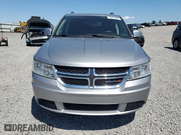 2017 Dodge Journey SXT with VIN 3C4PDDBG3HT591993, listed as a Copart auction lot 58241065 with 161,964 mi miles and Salvage title. Bid and sale history available at DreamBid. Image 5.