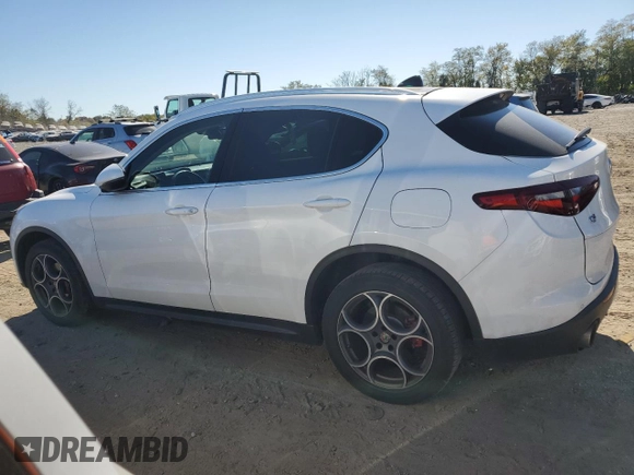 2019 Alfa Romeo Stelvio Ti Lusso z VIN ZASPAKBN2K7C49899, wystawiony jako Copart lot #77323474 z przebiegiem 88 826 mil mil oraz Szkoda całkowita • Salvage title. Historia ofert i sprzedaży dostępna na DreamBid. Obrazek 2.