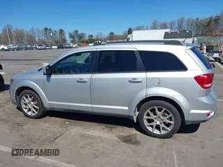 2014 Dodge Journey SXT z VIN 3C4PDCBG7ET227470, wystawiony jako IAAI lot #41843128 z przebiegiem 98 195 mil mil oraz . Historia ofert i sprzedaży dostępna na DreamBid. Obrazek 14.