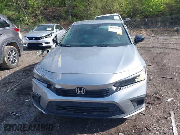 2022 Honda Civic Sport z VIN 2HGFE2F5XNH539174, wystawiony jako IAAI lot #41882680 z przebiegiem 15 664 mil mil oraz . Historia ofert i sprzedaży dostępna na DreamBid. Obrazek 12.