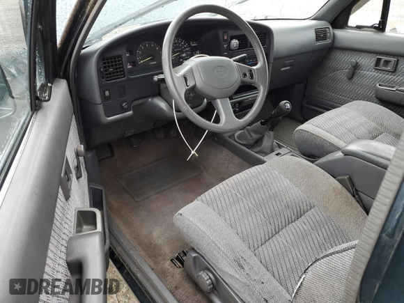1994 Toyota Pickup SR5 z VIN JT4VN13G1R5144243, wystawiony jako Copart lot #50839095 z przebiegiem 222 885 mil mil oraz Szkoda całkowita • Salvage title. Historia ofert i sprzedaży dostępna na DreamBid. Obrazek 8.