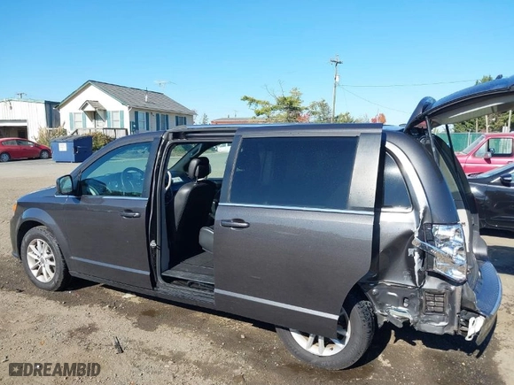 2019 Dodge Grand Caravan SXT with VIN 2C4RDGCG2KR656139, listed as a IAAI auction lot 40643548 with 126,674 mi miles. Bid and sale history available at carsss.com. Image 3.