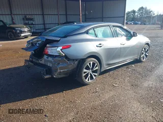 2016 Nissan Maxima SV z VIN 1N4AA6APXGC386974, wystawiony jako IAAI lot #41738932 z przebiegiem 132 395 mil mil oraz . Historia ofert i sprzedaży dostępna na DreamBid. Obrazek 4.