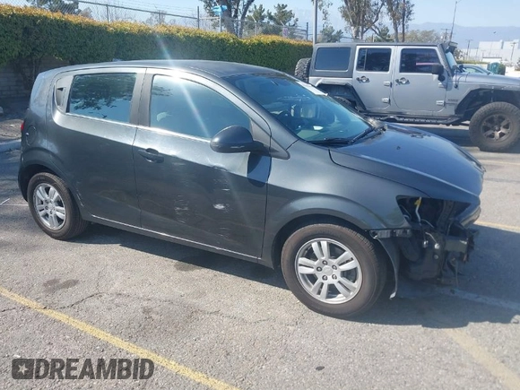2014 Chevrolet Sonic LT with VIN 1G1JC6SG4E4118781, listed as a IAAI auction lot 41862192 with 124,375 mi miles. Bid and sale history available at carsss.com. Image 1.
